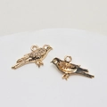 Vogel-Anhänger in Goldoptik mit Zirkonia-Kristallen für DIY-Schmuckherstellung - Vogel