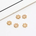 Detailed top view of 5 gold snowflake flower spacer beads for DIY jewelry making - 03# 4.5mm (Inner Diameter 1mm)