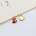 Detailed view of colorful enamel gourd pendants with golden hooks for DIY jewelry making - Style 03#
