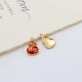 Macro shot of red enamel gourd pendants with golden auspicious text on a cozy background - Style 05#