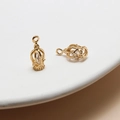 Macro shot of two golden crown-shaped charms with micro-pave zircons for DIY jewelry - 10+ / Gold (04#) Hollow Lantern