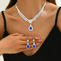 Elegant silver-tone necklace and earring set with teardrop blue gems for weddings - Blue (G300)