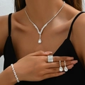 Sparkling crystal jewelry set with V-shaped necklace, earrings, bracelet and ring - 630 (4-Piece Set) / Silver