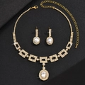 Elegant gold-plated jewelry set with oval crystal pendant necklace and earrings - Gold Duo (G357)