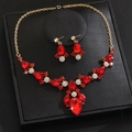 Elegante set di gioielli placcati in oro con cristalli rossi e accenti in zircone bianco - Rosso Oro