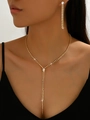 Detailopname van bruidssieradenset met kristallen Y-ketting en kwastjesoorbellen - Ketting Oorbellen (G410 Goud)