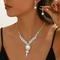 Elegant bridal necklace and earring set with shimmering crystals for formal occasions - White