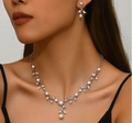 Silver bridal jewelry set with white pearls and crystals worn by a model - Silver White (04)