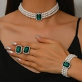 Detail of luxury three-layer pearl jewelry set with green emerald-cut gemstones and earrings - Silver Green Pearl Set (G455)