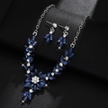 Close-up of floral necklace and earrings set with deep blue marquise-cut crystals - Dark Blue (G456)