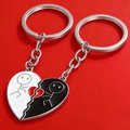 Portachiavi coordinati a forma di cuore con omini, finitura bianca e nera per coppie - Portachiavi Omino a Stecco / Argento
