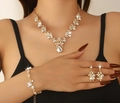 Elegant gold-tone rhinestone jewelry set featuring floral necklace, bracelet and earrings - Golden Floral Leaf Waterdrop Rhinestone Set / G394 Gold White Collection