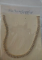 Elegant gold plated necklace with three rows of sparkling rhinestones in clear packaging - Gold Necklace