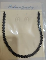 Sparkling black rhinestone necklace displayed on a jewelry card in individual packaging - Black Necklace