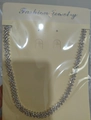 Three-row rhinestone choker necklace in silver finish on jewelry display card - Silver Necklace