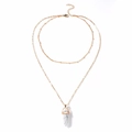 Close-up of double-layer gold chain necklace with white marble hexagonal stone pendant - White Turquoise