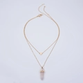 Detail of double-layer gold necklace with heart pendant and pink hexagonal crystal point - Rose Quartz