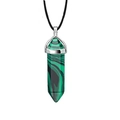 Detail of hexagonal malachite crystal pendant with silver clasp on black cord necklace - Malachite green