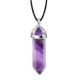 Detailed macro shot of a purple crystal hexagonal column pendant with silver metal clasp - Purple Crystal