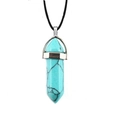 Close-up of hexagonal blue turquoise stone pendant with silver metal cap and black cord - Turquoise