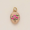Detailed macro view of an egg-shaped strawberry jam pendant with pink rose motifs - Oval Pink Flower Style