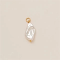 Macro shot of a baroque irregular pearl pendant with a golden loop and bead detail - Irregular Pearl Pendant (Without Chain)