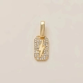 Macro view of gold-plated rectangular pendant with lightning bolt and white zircons - Rhinestone Lightning Bolt