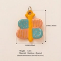 Gelber und blauer Schmetterlingsanhänger aus Edelstahl mit Emaille-Oberfläche - Schmetterlingsanhänger