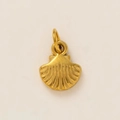 Detailed view of a golden scallop shell pendant with embossed stripes and a round bail - Scallop Pendant (24)