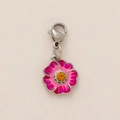 Detailed macro view of an 18K gold plated flower pendant with enamel and central gemstone - Silver Pink Flower