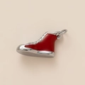 Detailed view of a red and silver high-top sneaker pendant with glossy enamel finish - High-top Shoes