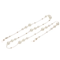 Detailed close-up of golden eyewear chain featuring elegant pearls and lobster clasps - Gold
