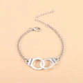 Silver handcuffs pendant necklace featuring engraved Freedom text on O-chain with lobster clasp - Handcuff Bracelet
