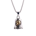 Detail of silver eagle bell pendant with gold eagle relief and black flame patterns - Gold Silver Tone (With Box Chain)