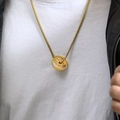 Close-up of gold fitness dumbbell pendant necklace with motivational engraving on male model - Gold Pendant Only (Without Chain)