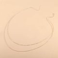 Catenina per il corpo dorata a strati minimalista con chiusura a moschettone e catena - Oro