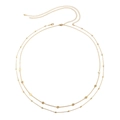 Doppelreihige goldene Taillenkette mit Pailletten und Perlen auf weißem Hintergrund - Gold