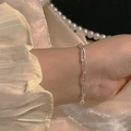 Close-up of double layer silver bracelet with hammered texture on female wrist - Openwork Bracelet / Silver