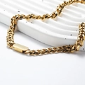 Polished golden cuban link necklace with a smooth rectangular clasp on stone stand - Necklace Style A (Width 9mm) / Gold