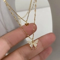 Collier doré double couche avec pendentifs papillons scintillants et zircons - Style Double Couche / Or