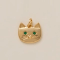 Detailed view of a gold-plated cat pendant featuring green gemstone eyes and heart nose - Cat Pendant