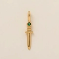 Detailed view of a gold dagger pendant with a green gemstone center and polished finish - Sword Pendant