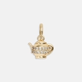 Detailed macro view of 18K gold-plated teapot pendant with sparkling zircon inlay - Kettle