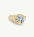 Close-up of nautical signet ring with blue enamel swallow and anchor engravings - Adventurer Swallow / Gold
