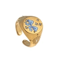 Vintage style gold adjustable ring with blue bow detail and engraved compass design - Blue Bowknot Compass Ring