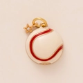 Detail of baseball charm with cream enamel, red stitching, and gold star accent - Baseball
