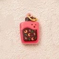 Close-up of pink magic potion bottle pendant with moon and star pattern in 14K gold - No.10 Drifting Bottle