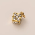 Macro shot of 18k gold plated cube pendant with sparkling cubic zirconia crystals - Dice Pendant