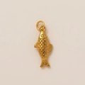 Macro view of 18K gold plated fish pendant showing detailed scales and carving texture - Fish Pendant