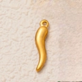 Detailed close-up of a 18K gold-plated cornicello horn pendant on a textured background - Chili Pendant